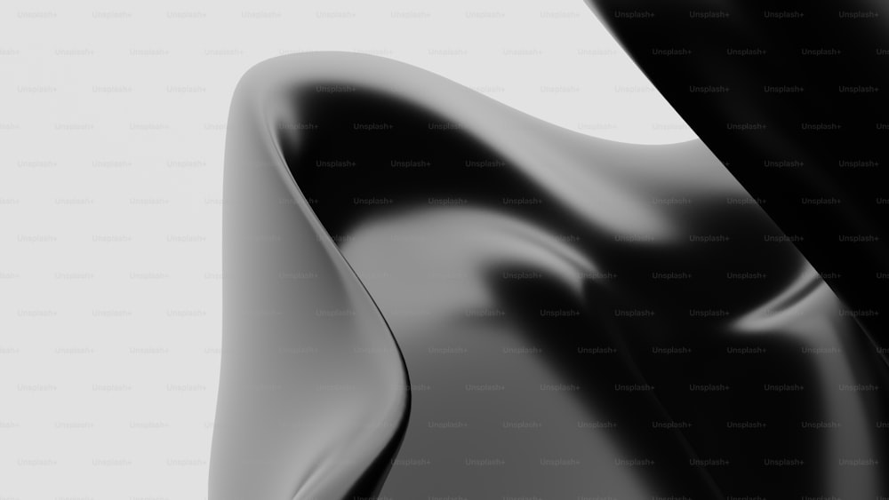une photo en noir et blanc d’un objet courbé