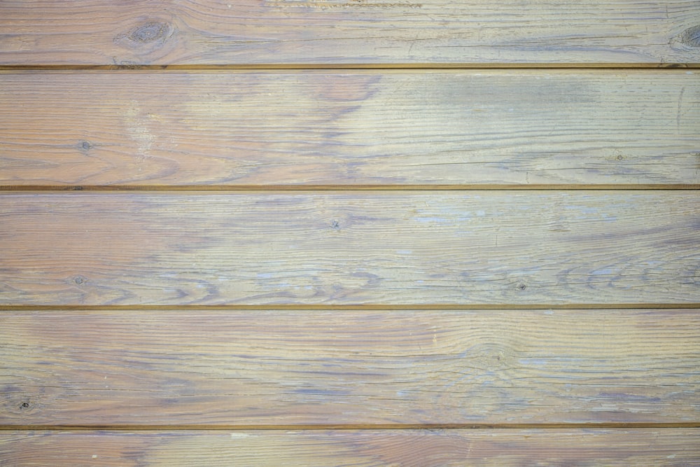 um close up de uma parede de tábua de madeira
