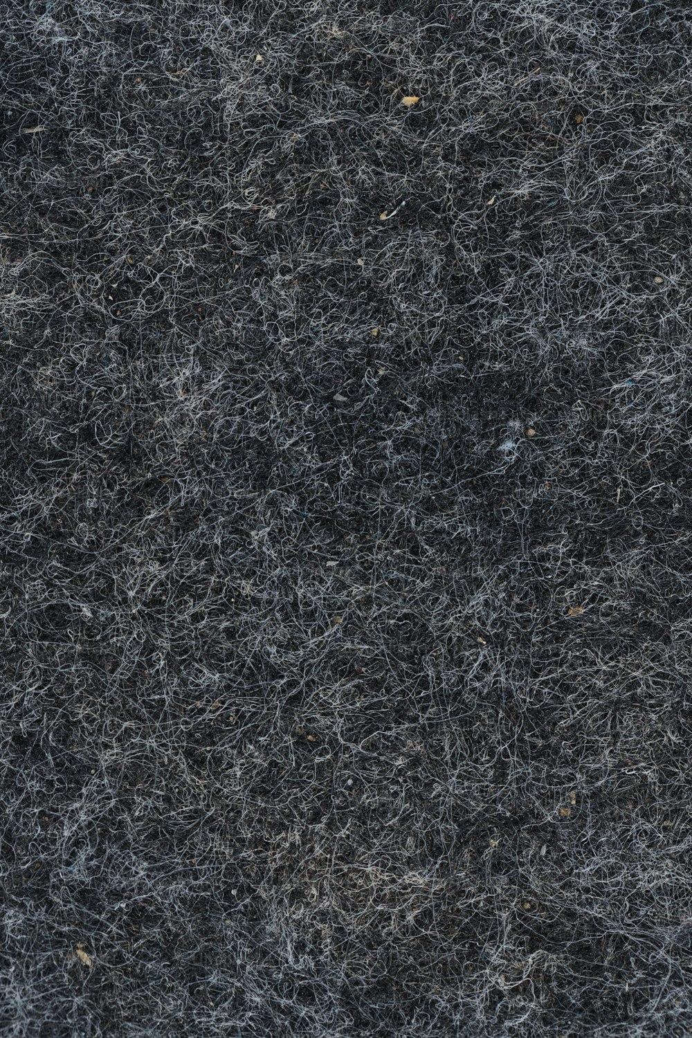 a close up of a black and white textured surface
