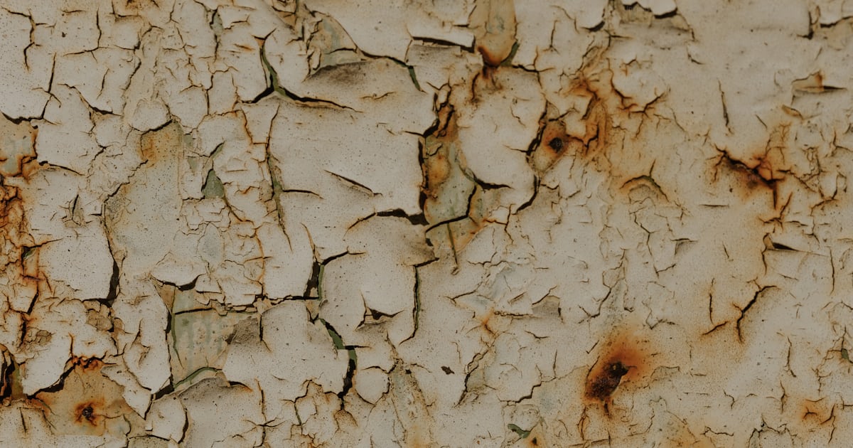 A rusted metal surface with lots of rust on it photo – Rust Image on ...