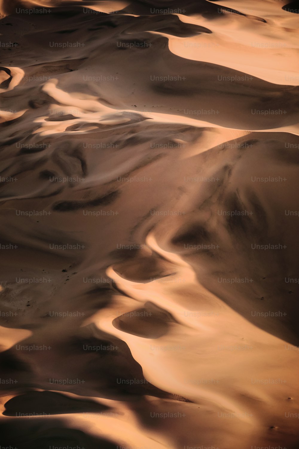 a view of a desert with sand dunes