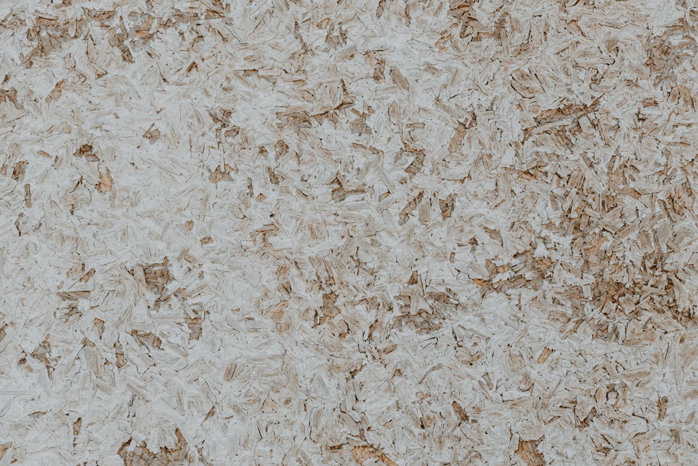 a close up of a wall made of wood chips