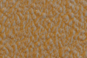 a close up of a yellow and white textured background