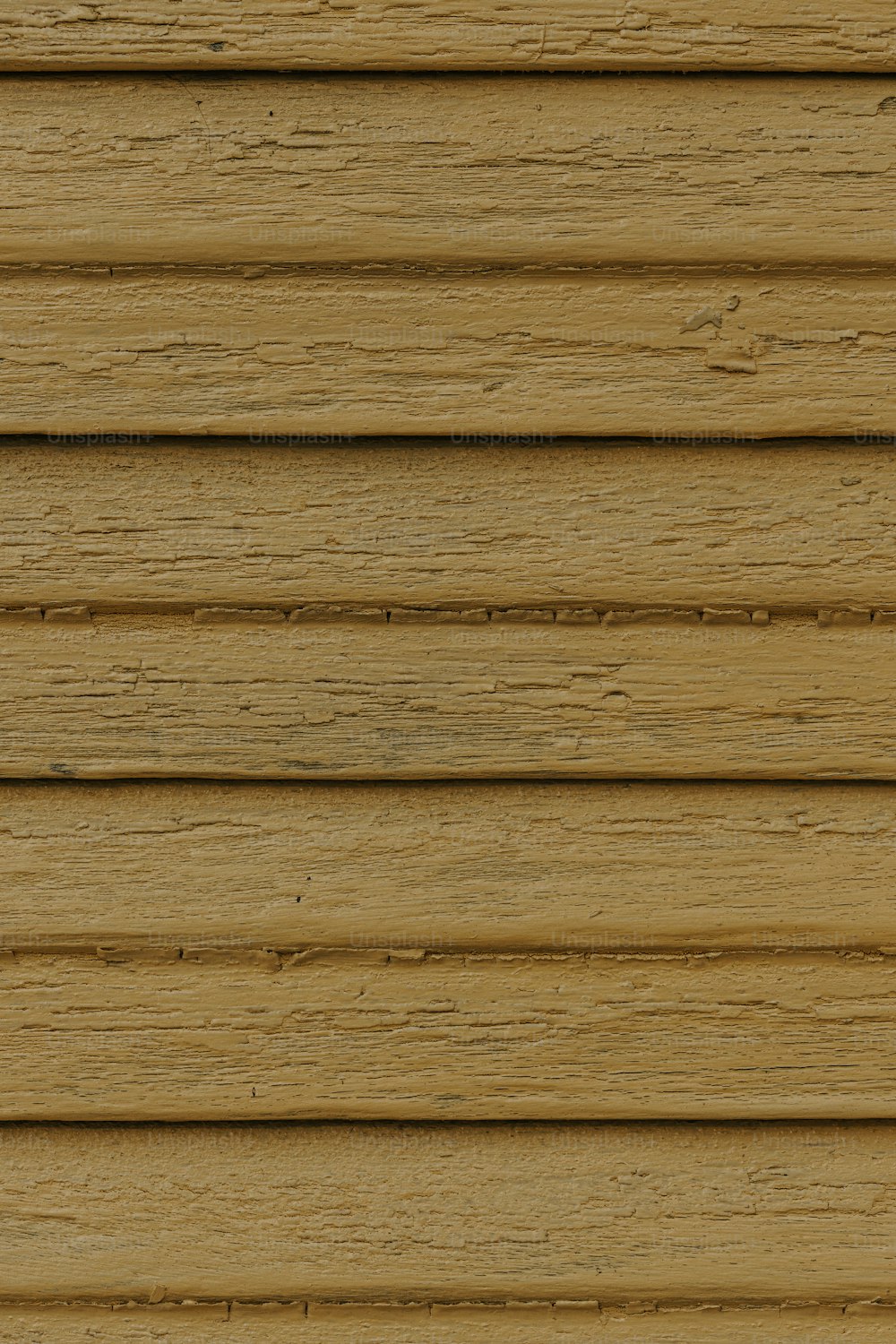 a close up view of a wooden siding