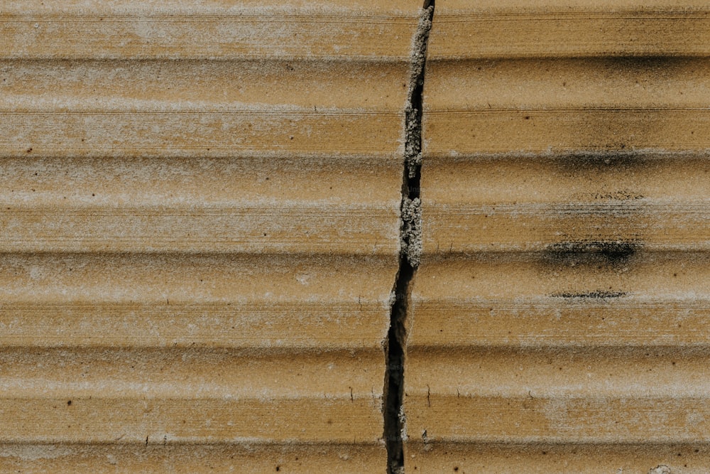 a close up of a crack in a wall