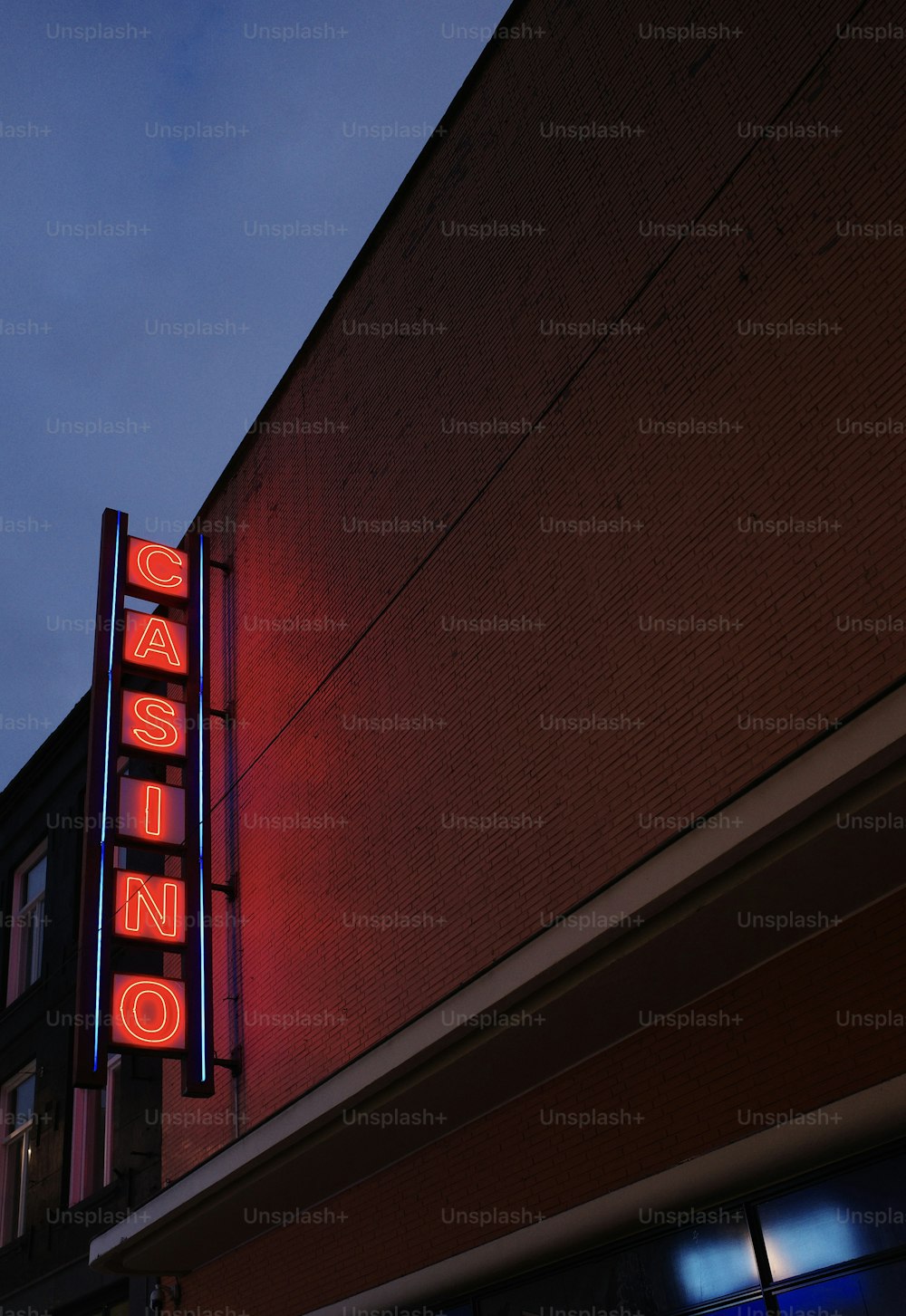 a neon sign on the side of a building