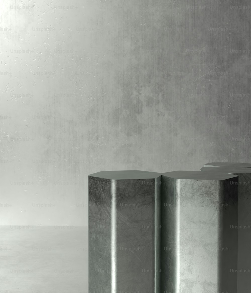 2つの金属シリンダーの白黒写真
