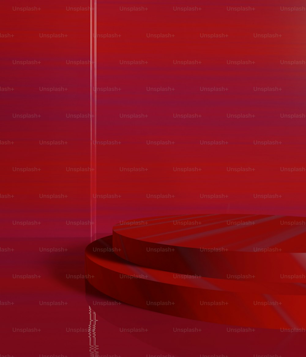 Un oggetto circolare rosso su sfondo rosso