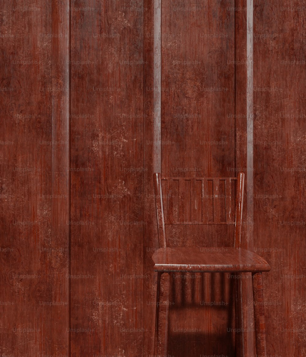Una silla de madera sentada frente a una pared de madera