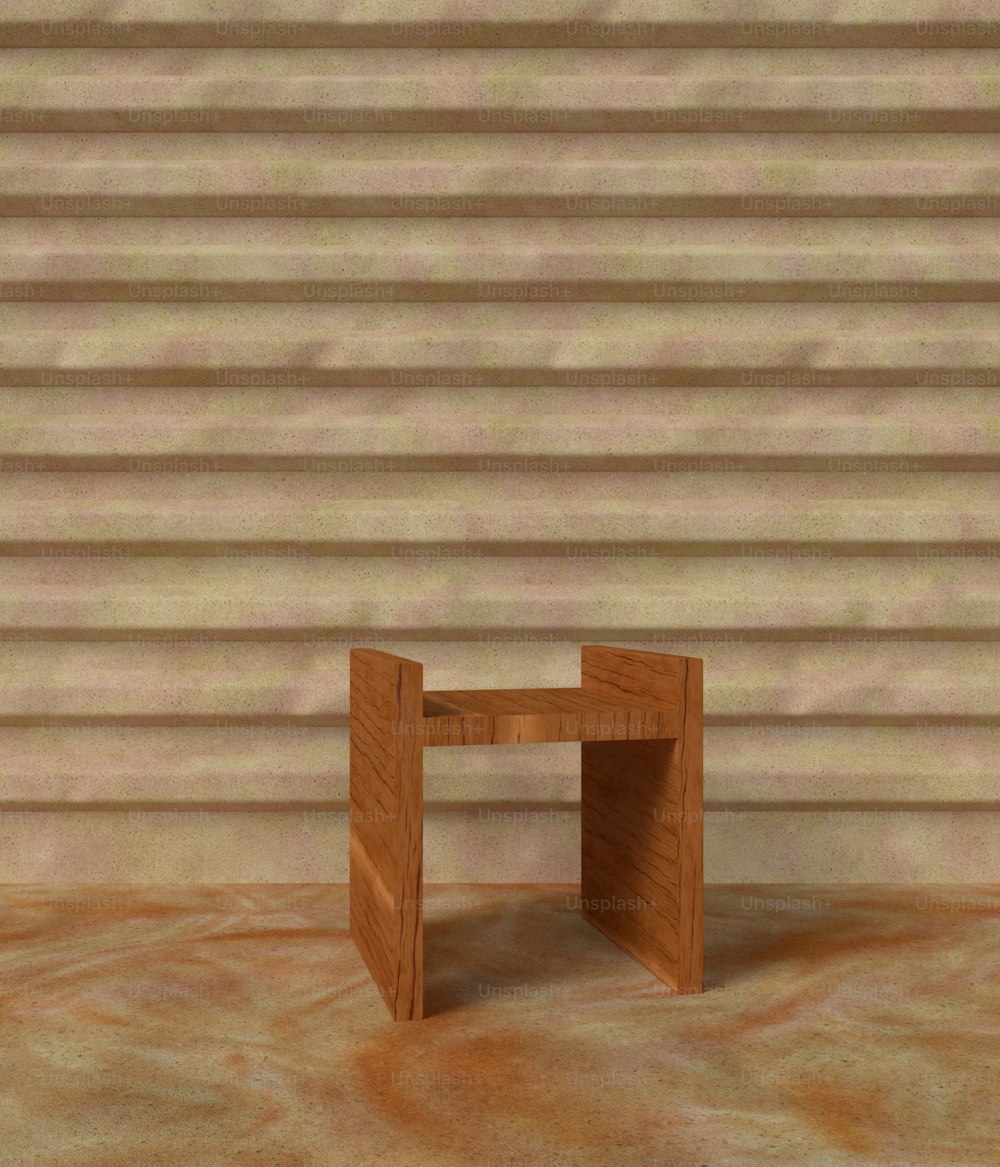 a small wooden table sitting in front of a wall