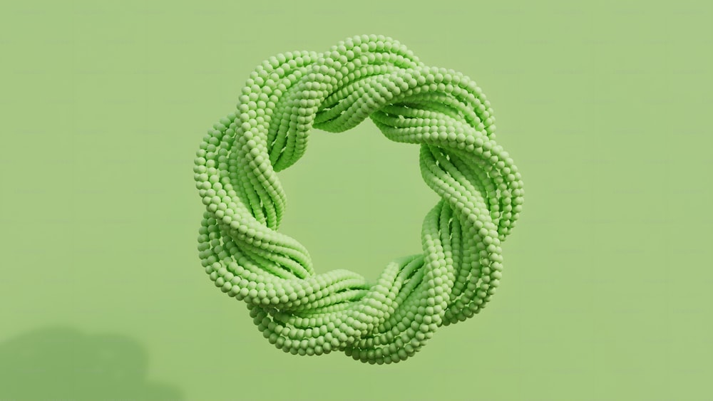 a close up of a rope on a green background