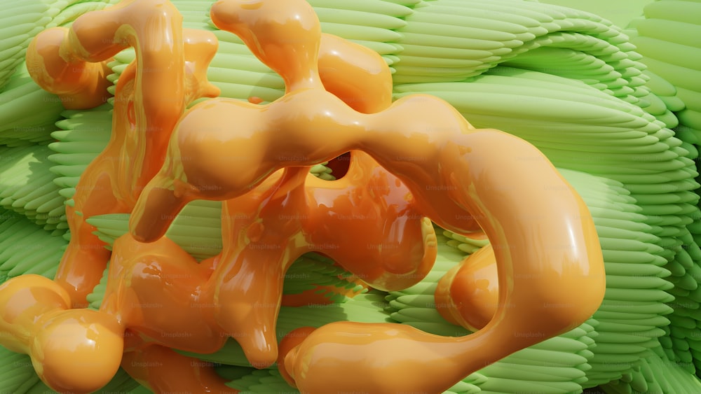 a close up of a green and orange substance