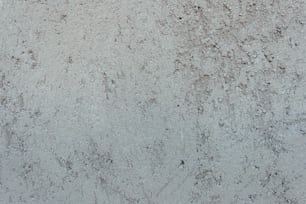 a close up of a white marble surface