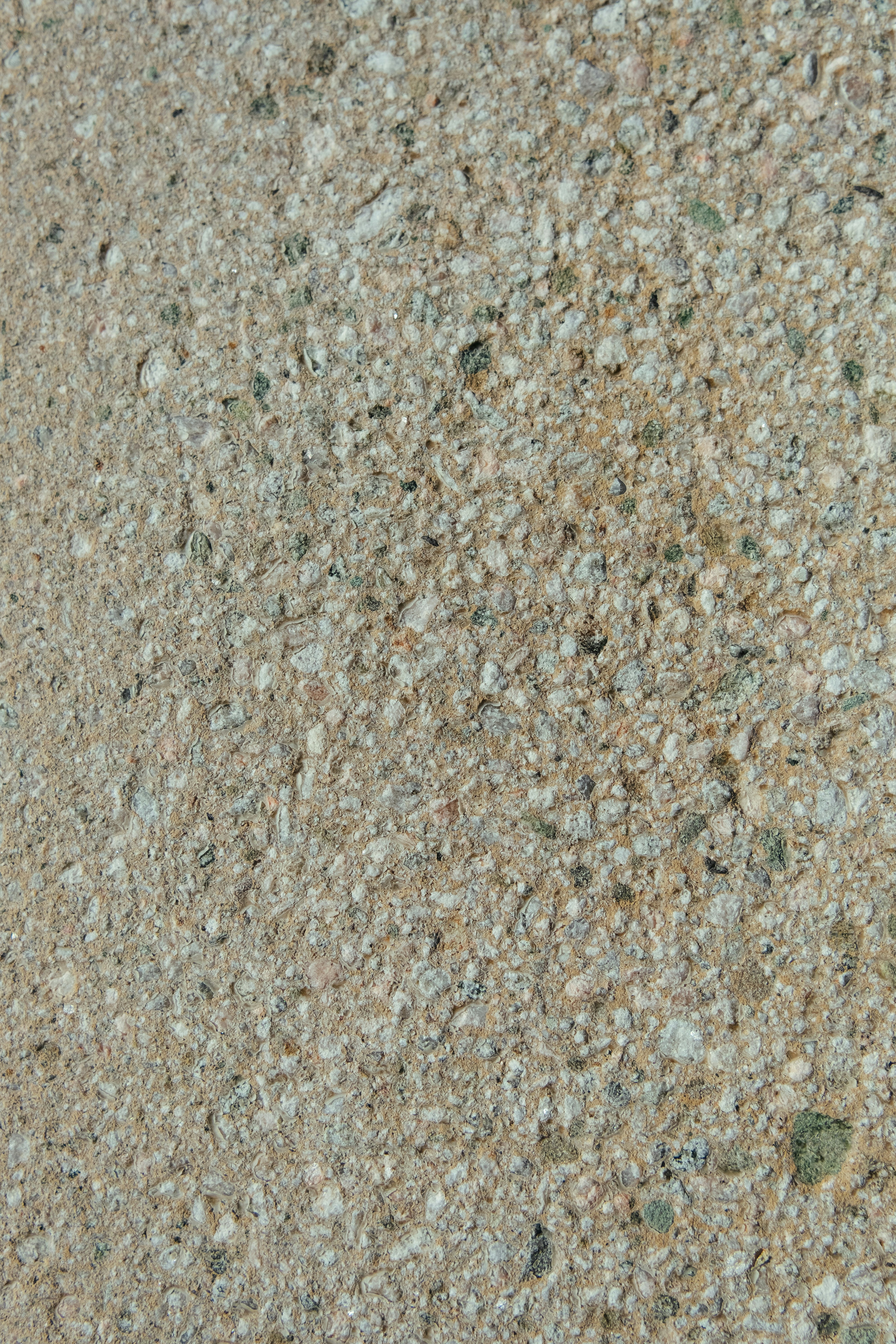 a close up of a stone surface with small rocks