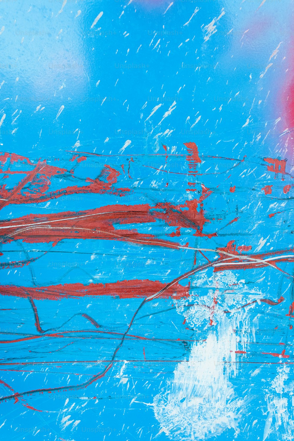 a painting of a blue sky with red lines