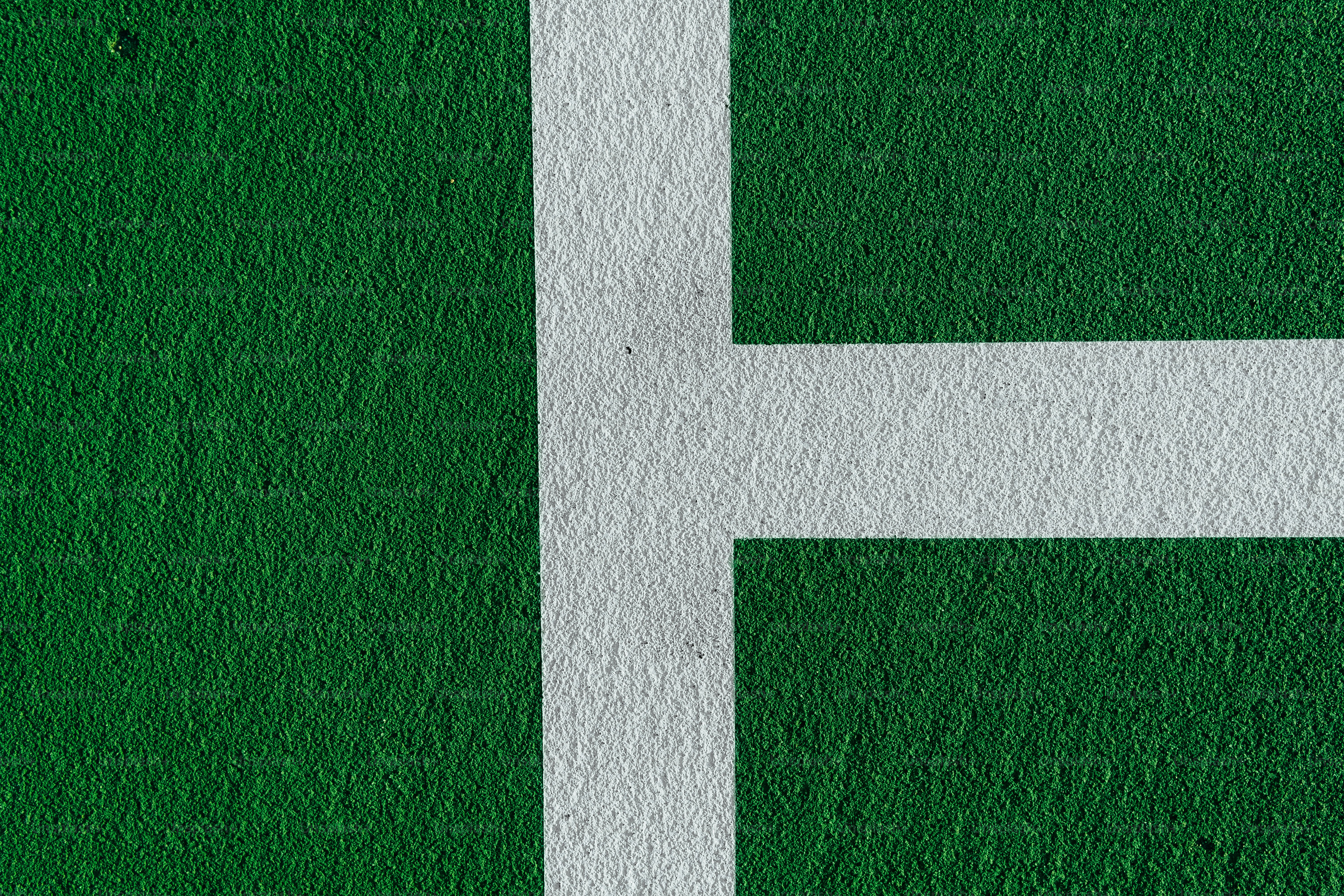 a tennis court with a white line painted on it
