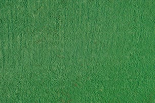 an overhead view of a green grass field