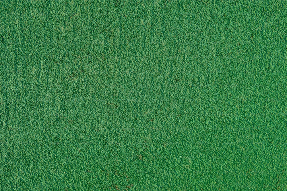 an overhead view of a green grass field