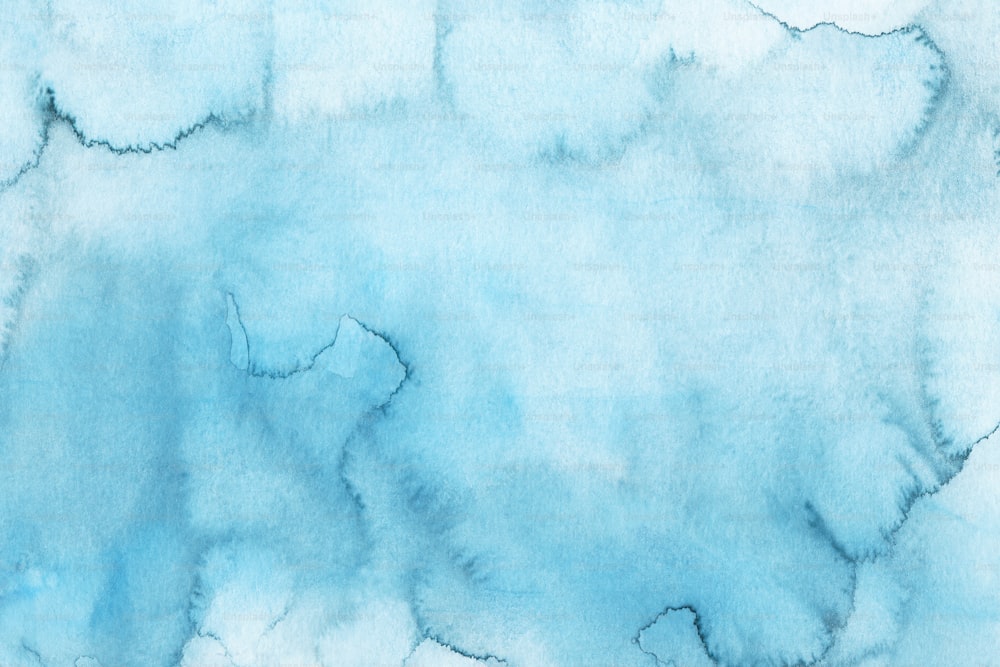 a watercolor painting of a blue and white background