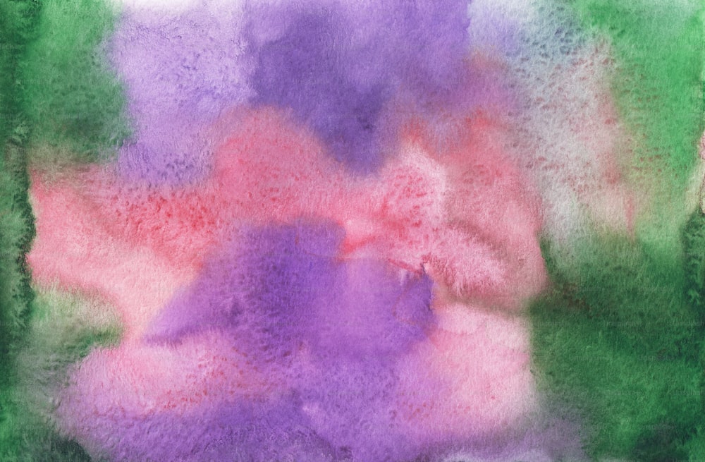 Un'immagine sfocata di fiori rosa e viola