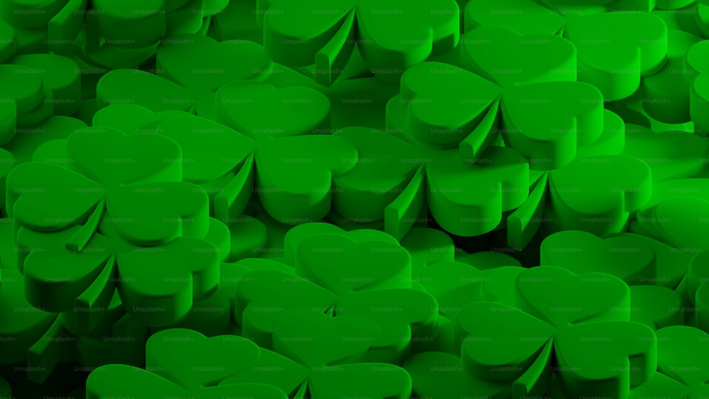 a large group of green shamrocks in the shape of clovers