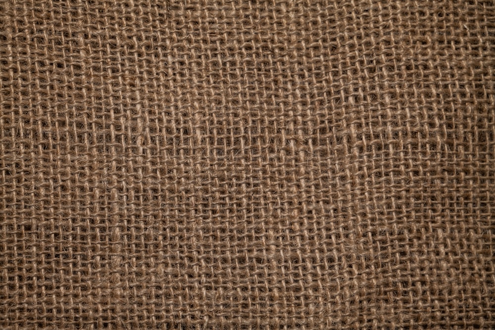 Gros plan d’une texture de tissu brun