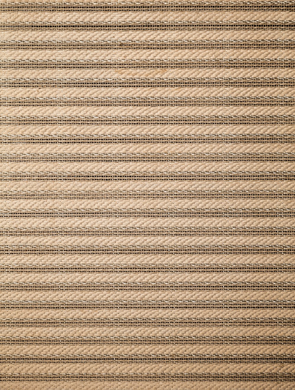 a close up of a rug with lines on it