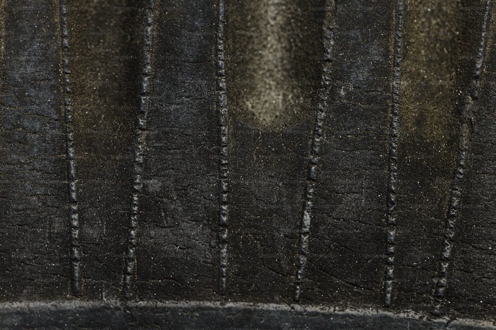 a close up of a piece of black leather