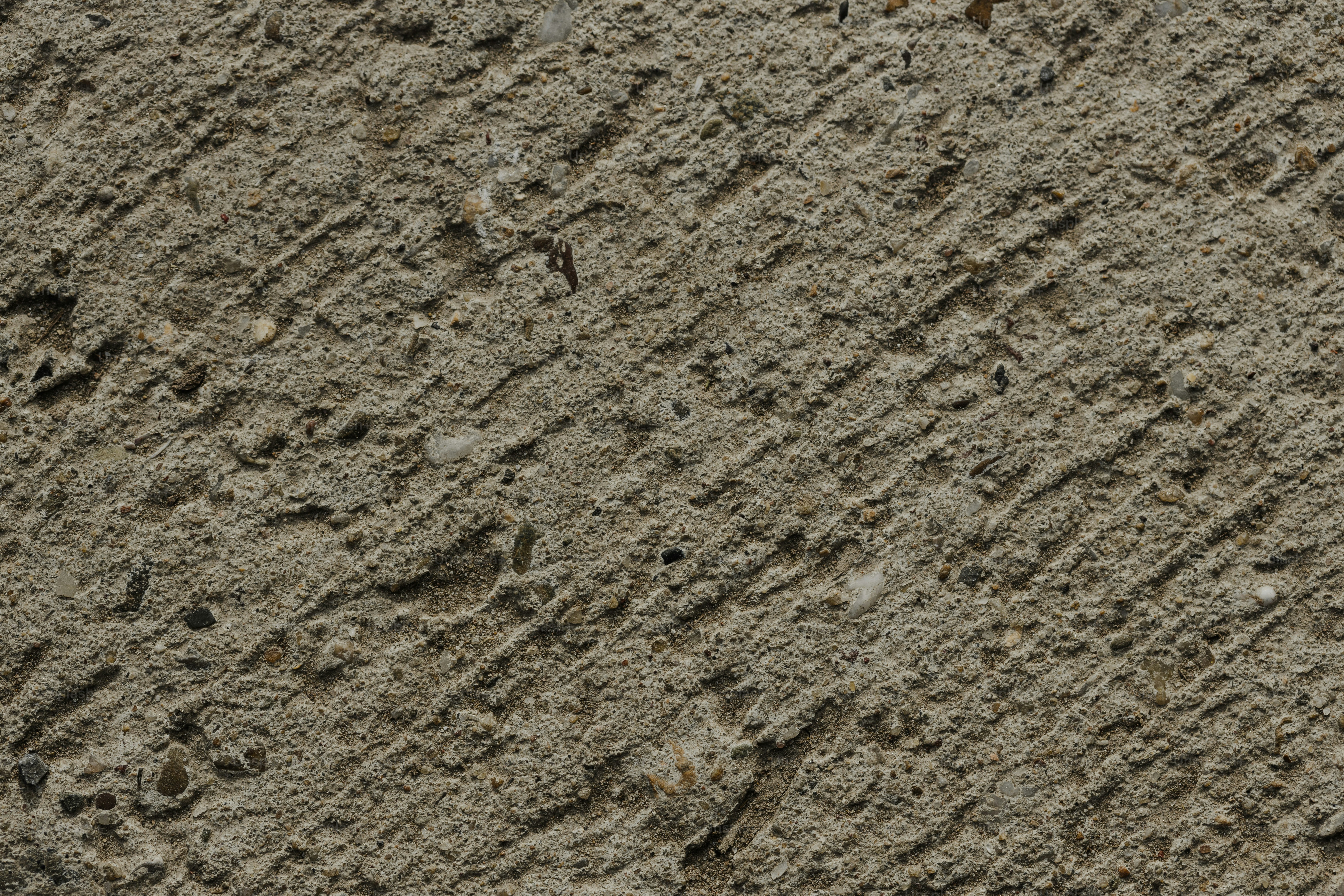 a close up of a bird's footprints in the sand