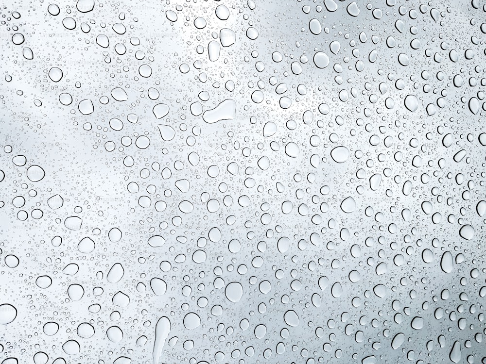 a close up of water droplets on a window