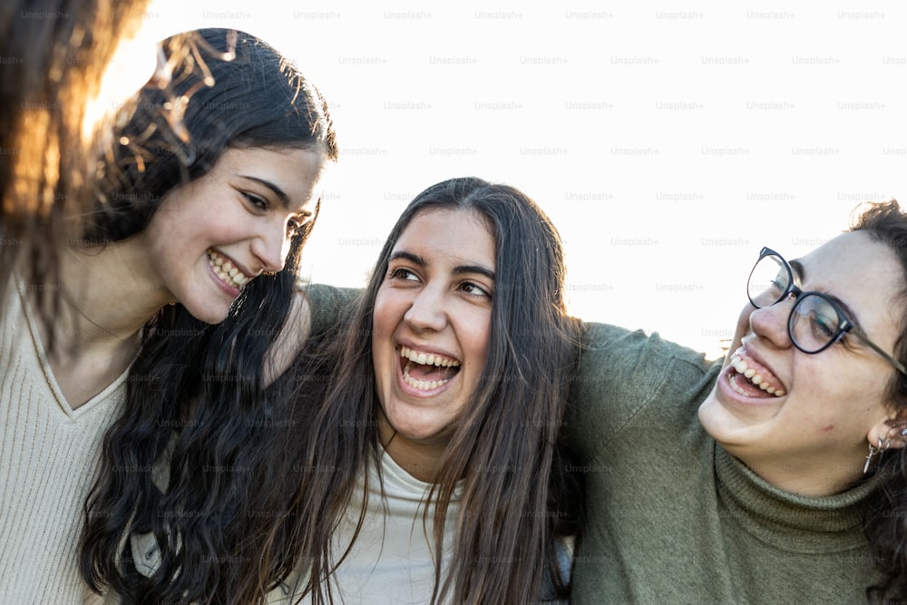 a group of young women standing next to each other