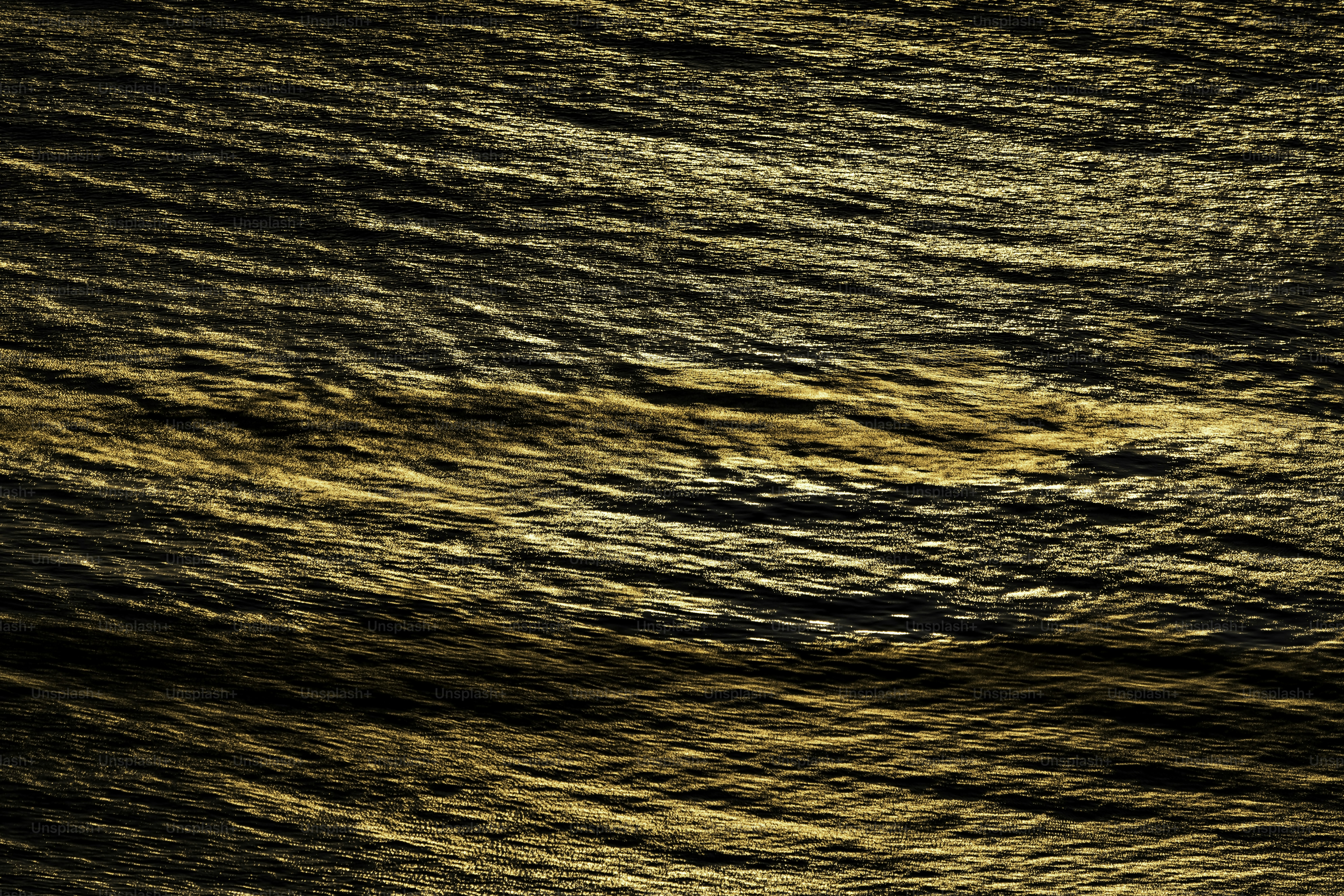 a large body of water with waves in it