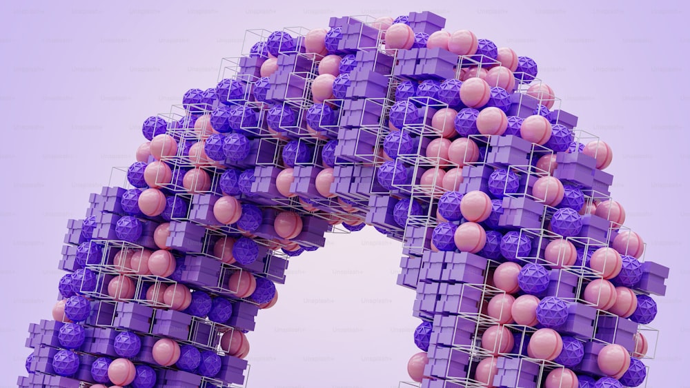 a sculpture made of purple and pink blocks