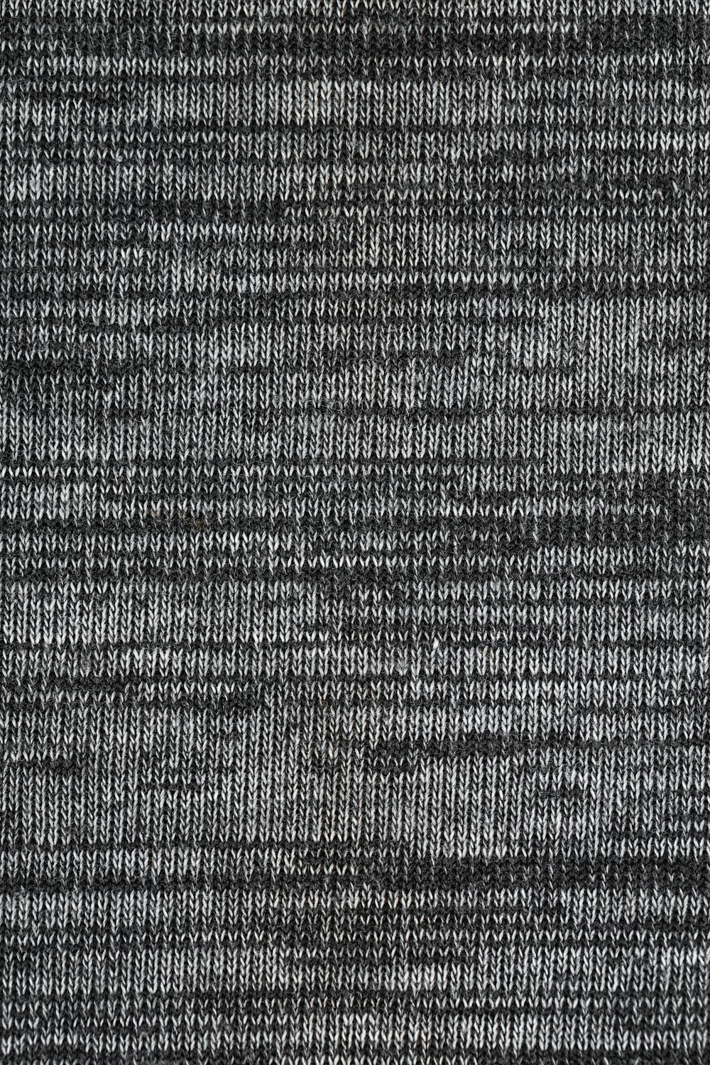 a close up of a black and white rug