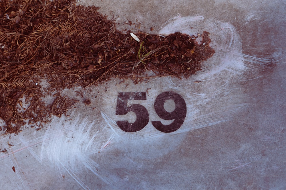 a pile of dirt with the number fifty on it
