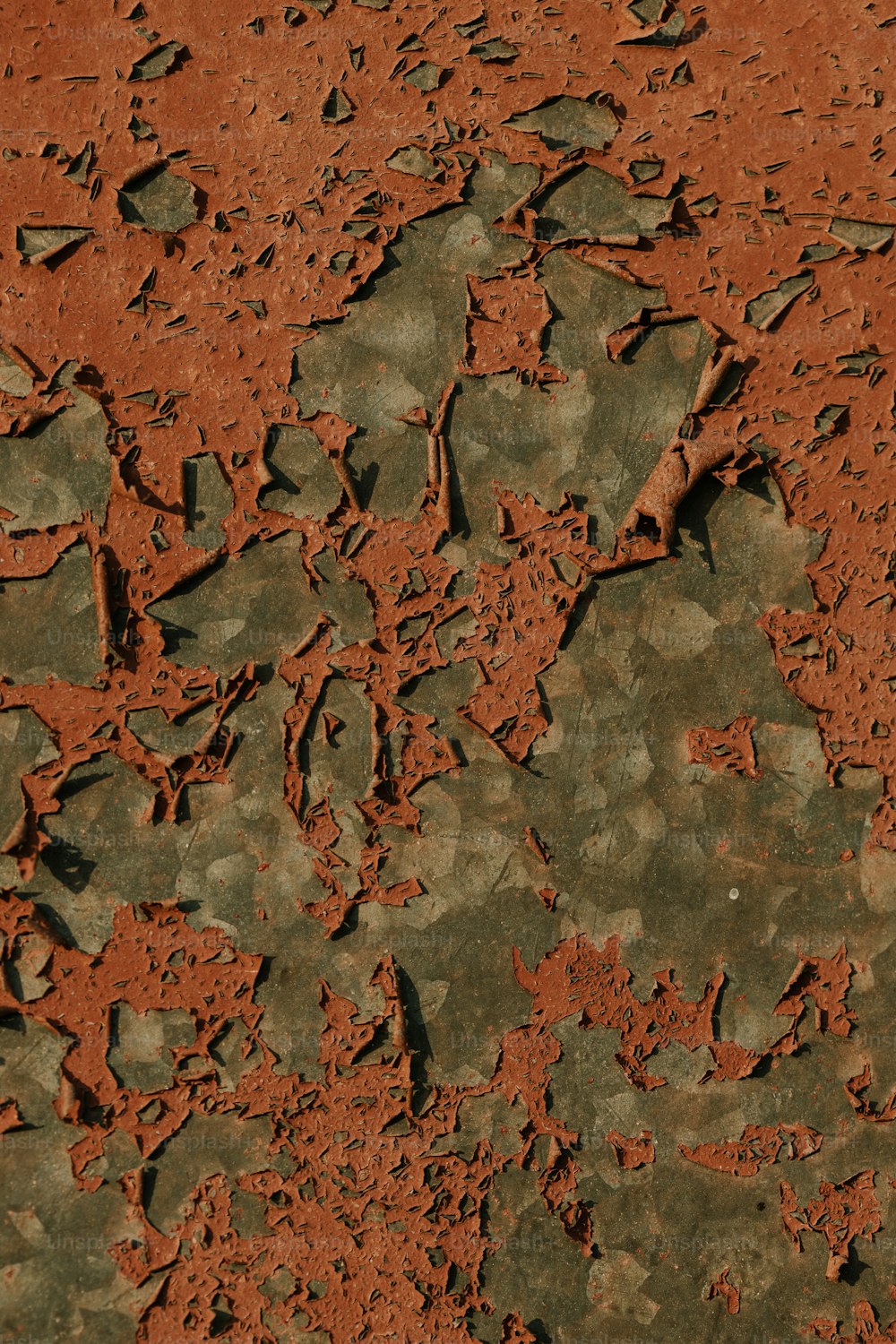 a close up of a dirt surface with small cracks