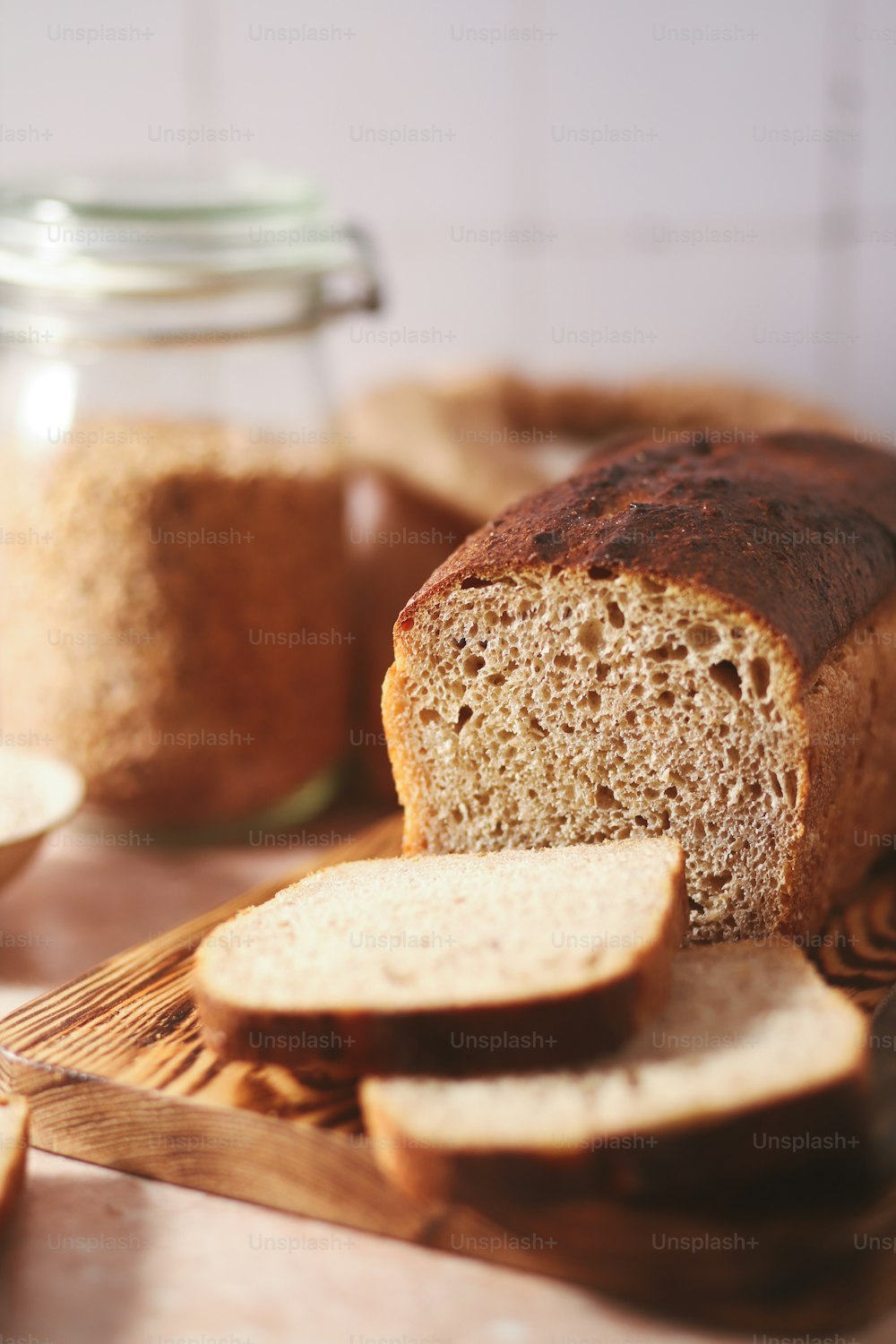 a loaf of bread sitting on top of a cutting board