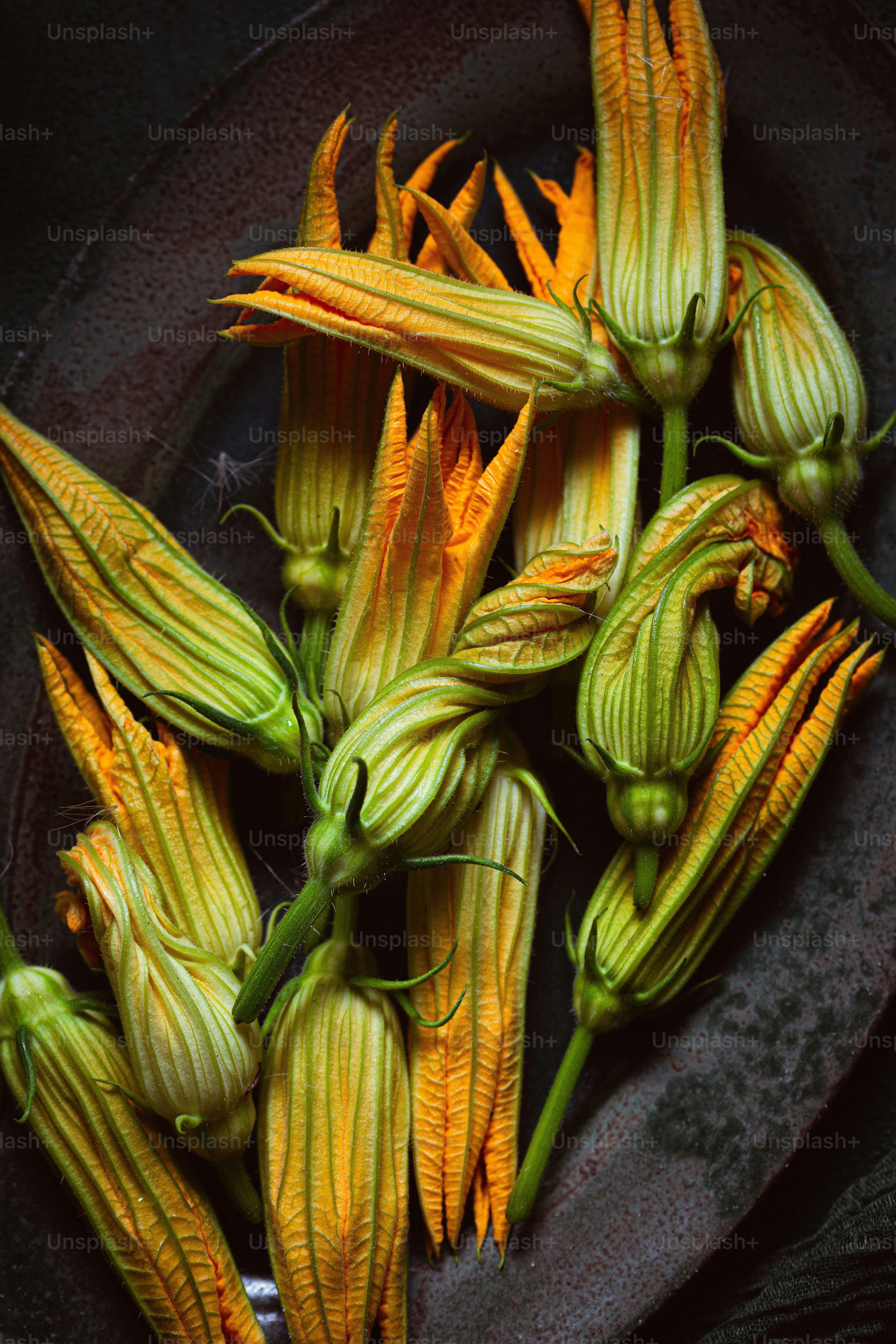 a bunch of flowers that are on a plate