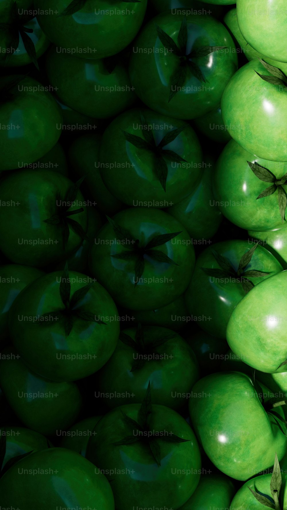 a large group of green apples stacked on top of each other