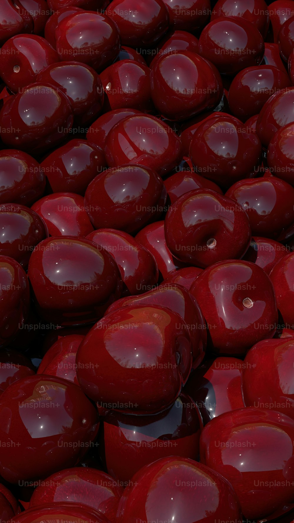 muchas manzanas rojas que están en una pila