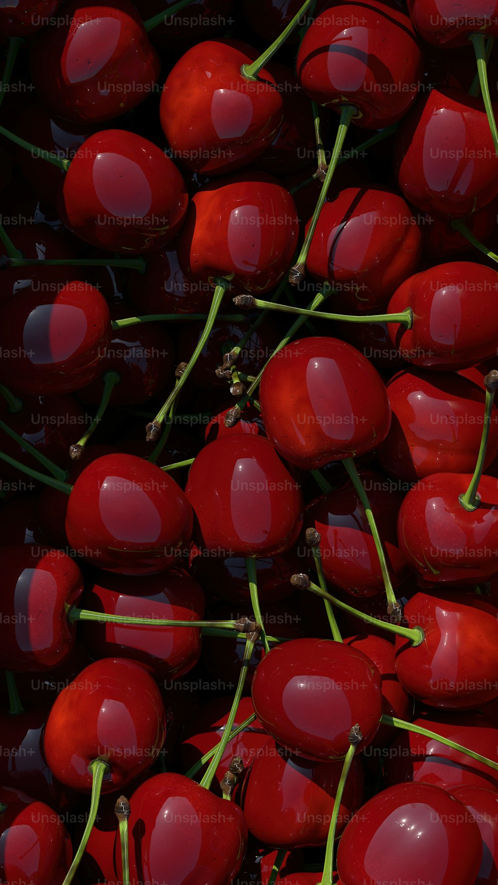 Un montón de cerezas rojas sentadas una encima de la otra