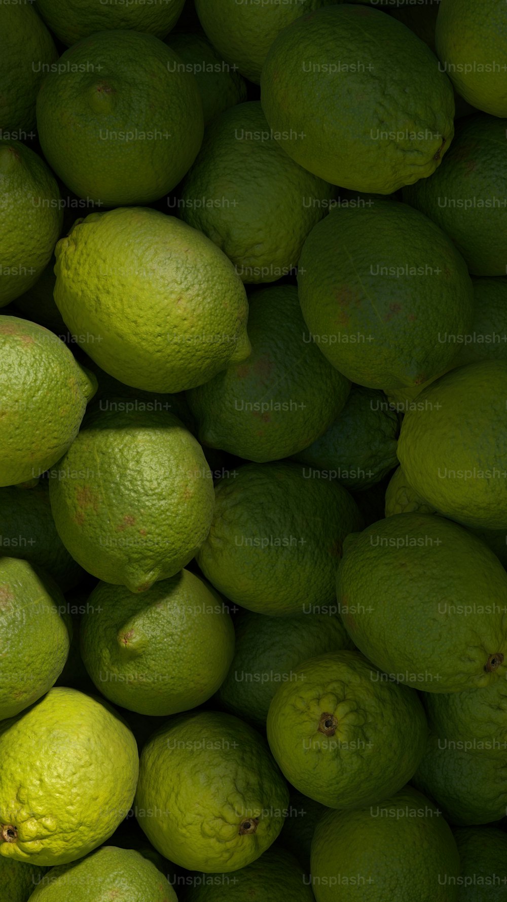 a pile of limes sitting next to each other