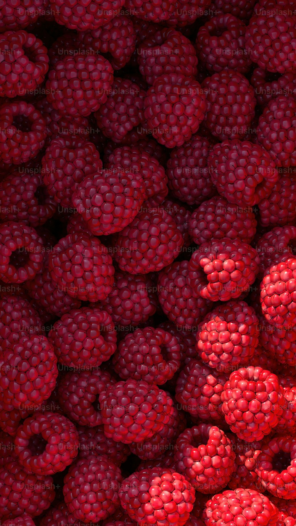 a bunch of raspberries that are red