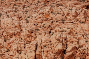 a large rock formation in the middle of a desert