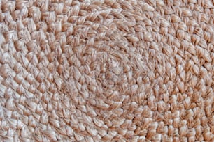 a close up view of a woven area rug