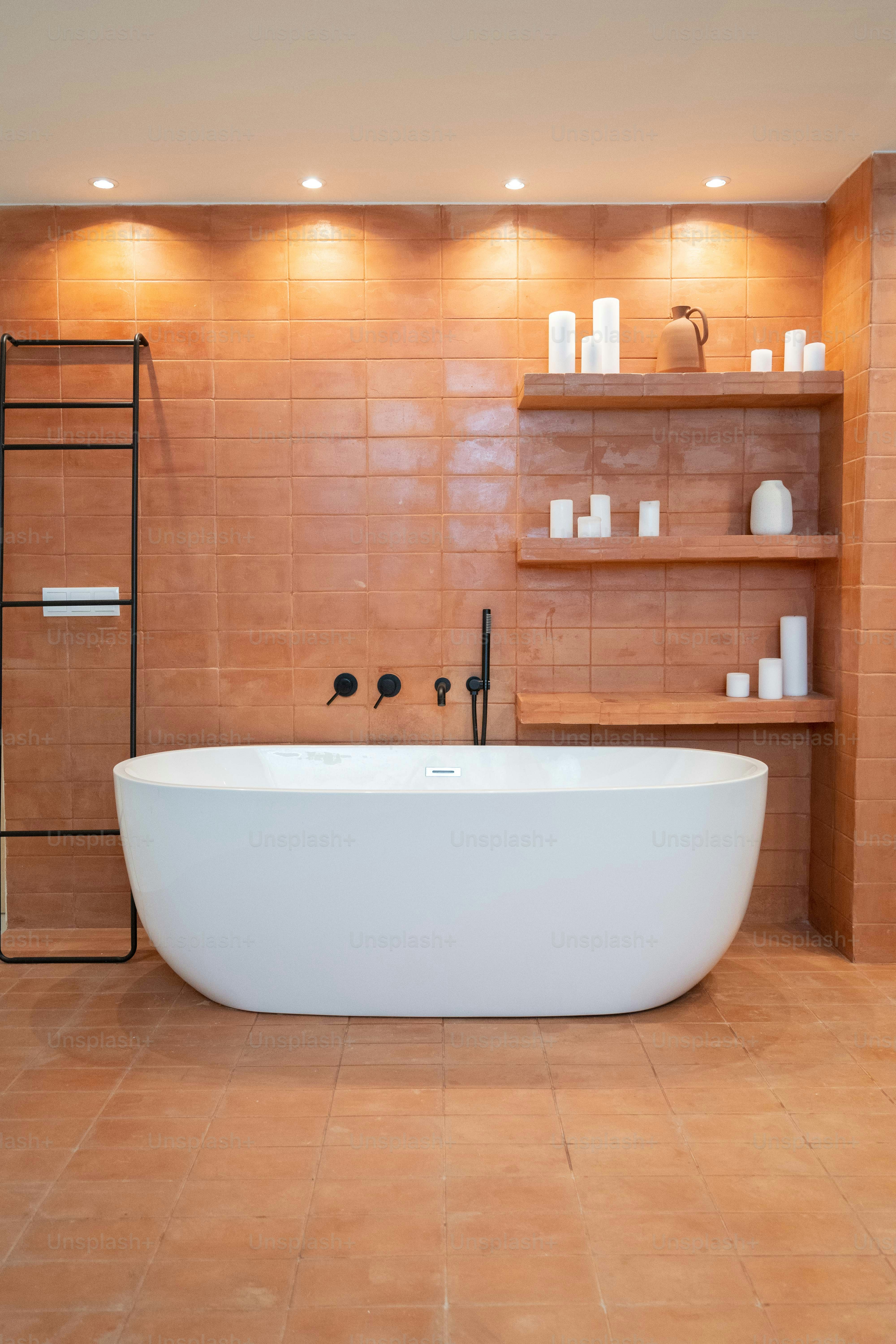 a large white bath tub sitting inside of a bathroom
