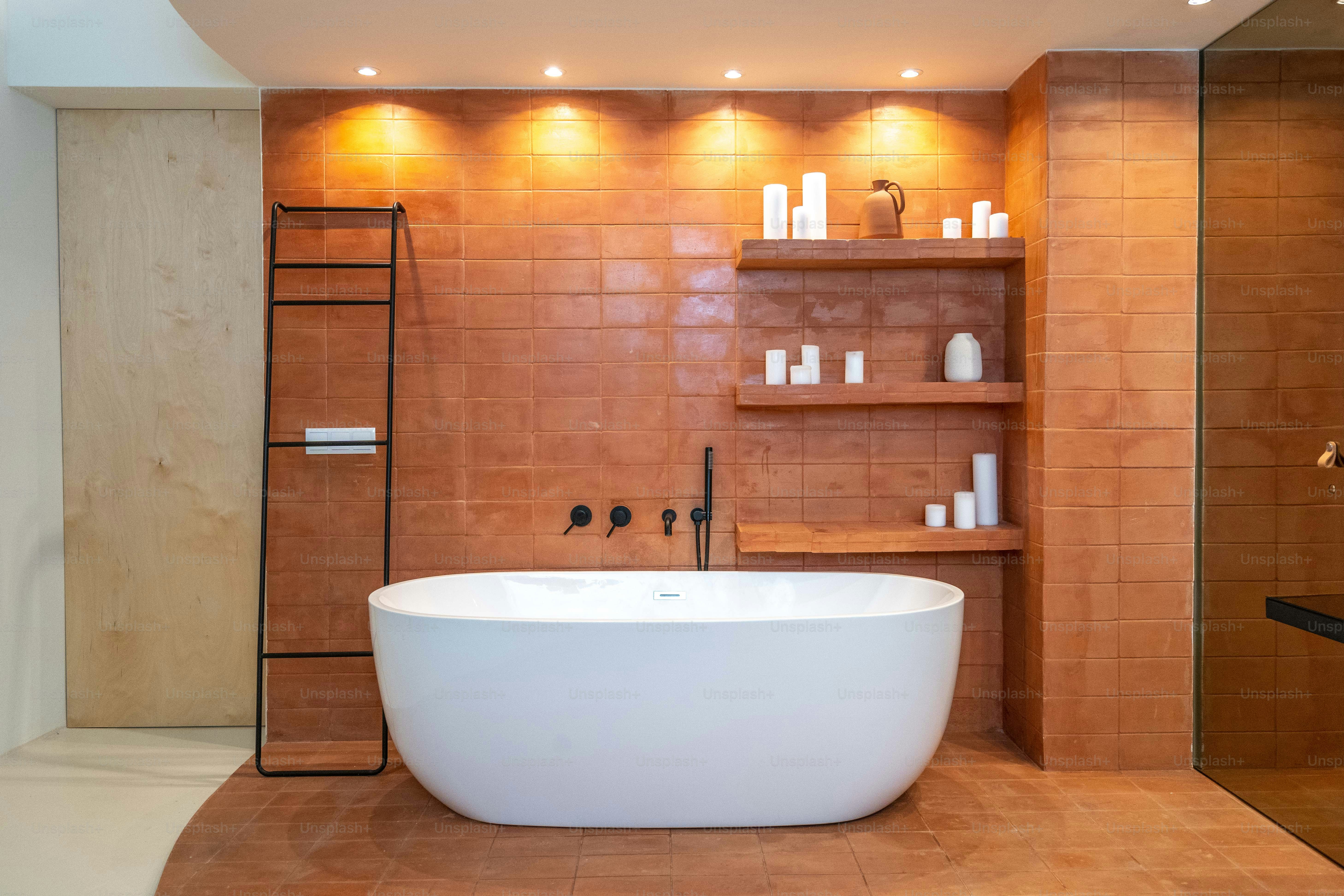 a large white bath tub sitting inside of a bathroom