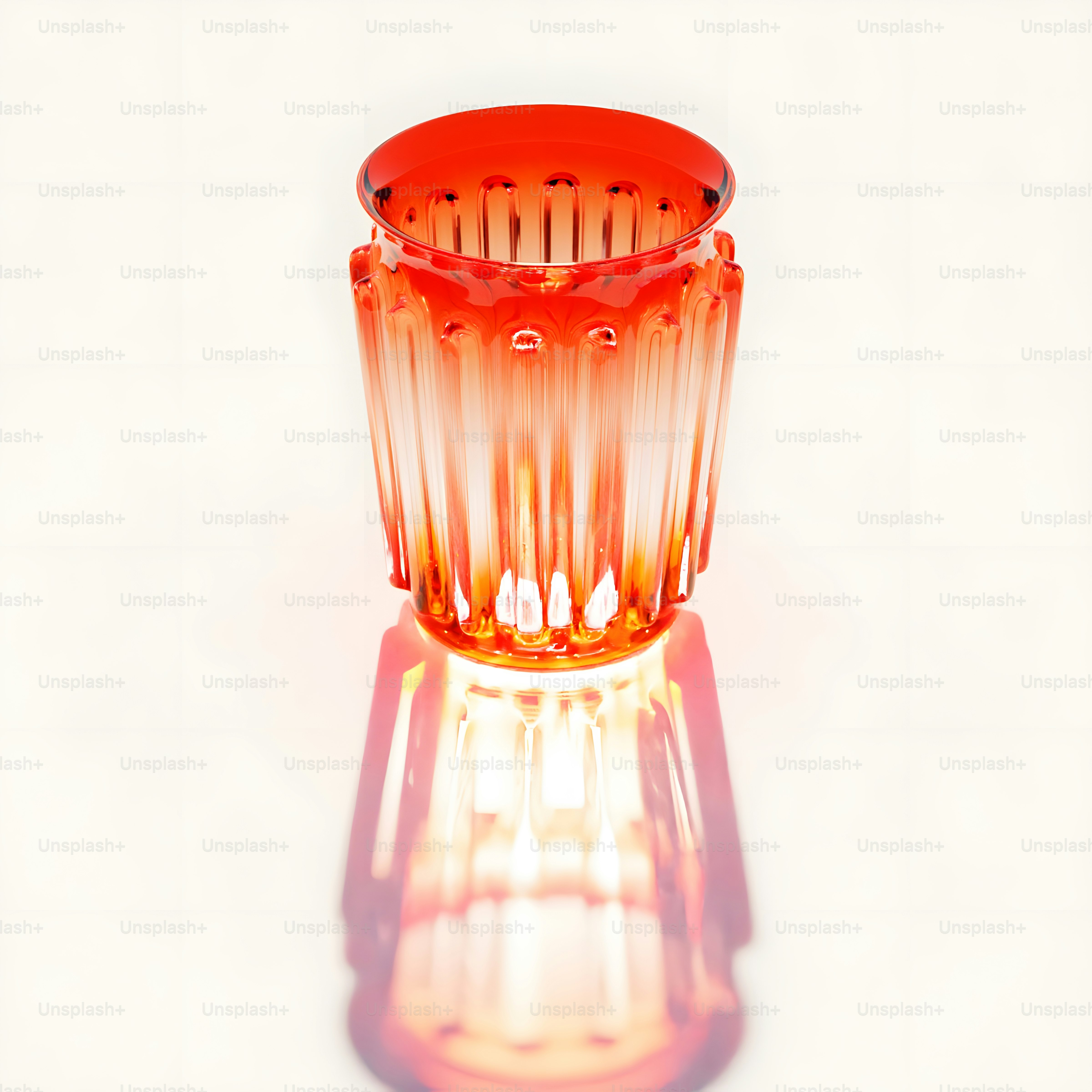 A glass vase sitting on top of a table photo – Wallpaper Image on Unsplash