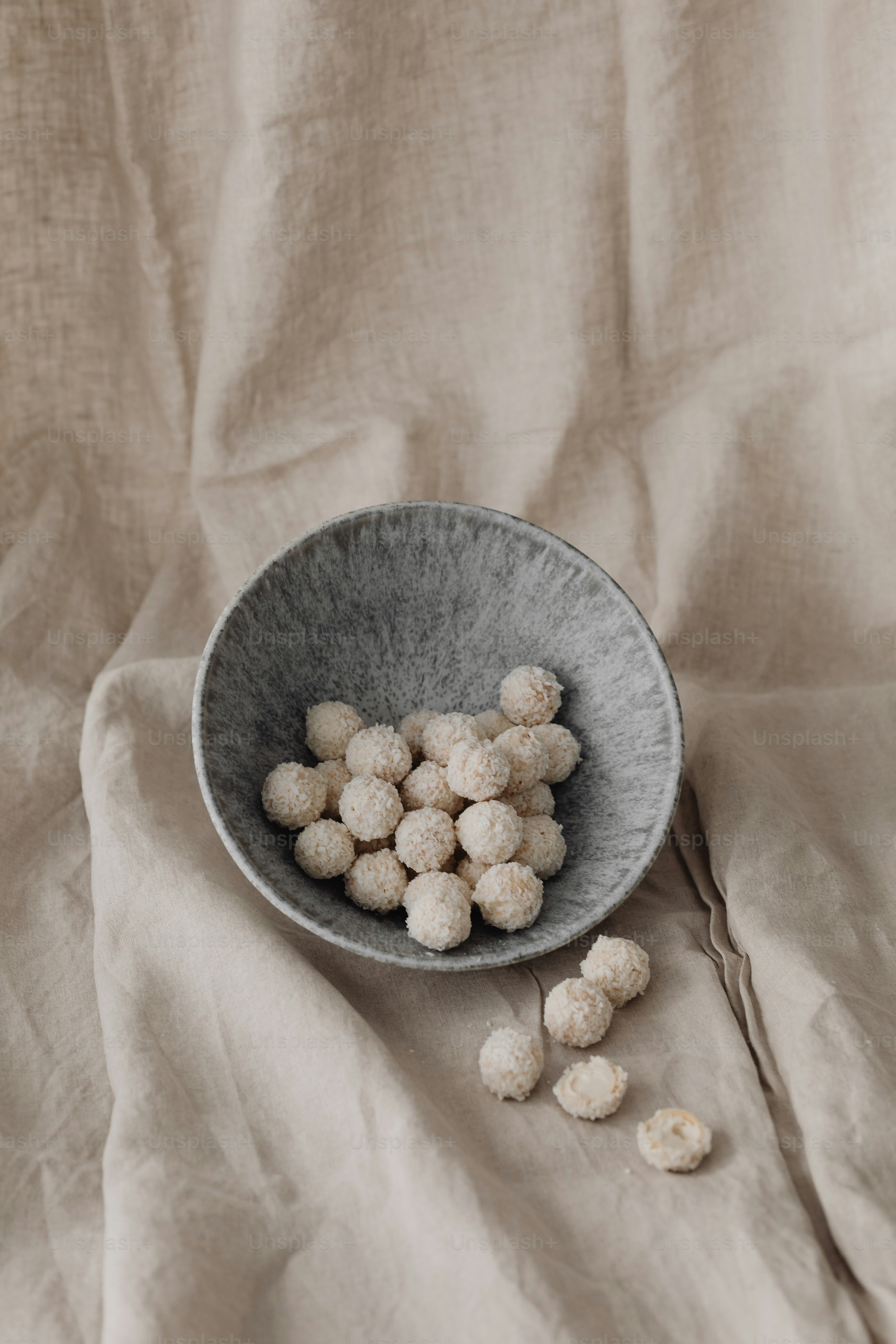 a bowl of food sitting on top of a table