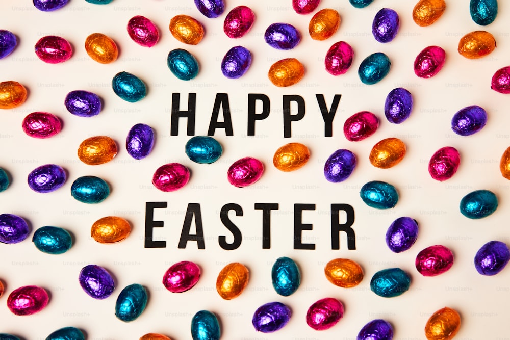 a happy easter message surrounded by chocolate eggs